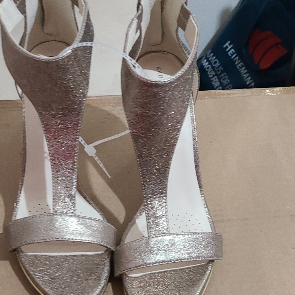 Gold high heel shoes